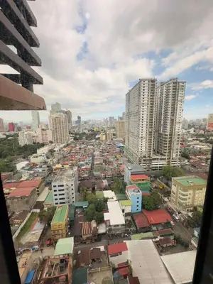 a view of a city with tall buildings at 1 BEDROOM Staycation in Manila