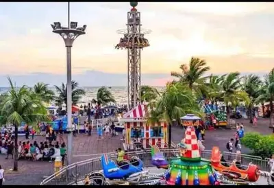 a amusement park with a roller coaster and a amusement park at Shore Residence 1 Bedroom Staycation in Manila