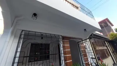 a house with a gate in front of it at Affordable Whole house 2-story 3 bedroom Greenpark villas imus phase 1 in Imus