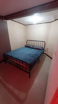 a bedroom with a bed in a room at Affordable Whole house 2-story 3 bedroom Greenpark villas imus phase 1 in Imus