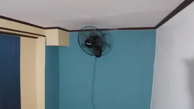 a fan on a ceiling in a room at Affordable Whole house 2-story 3 bedroom Greenpark villas imus phase 1 in Imus