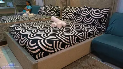 two beds with stuffed animals sitting on top of them at Nethcondo in Manila