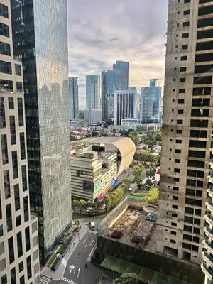 an aerial view of a city with tall buildings at ElixirStaycation at Knightsbridge Residences in Manila