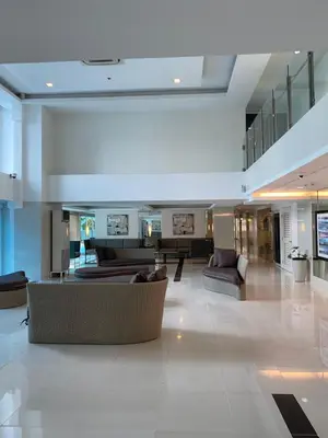a large living room with couches and a couch at jazz residence in Manila