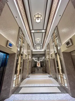 a hallway in a building with a ceiling at SG Urban Staycation in Manila
