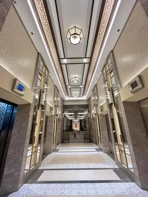 a hallway in a building with a ceiling at SG Urban Staycation in Manila