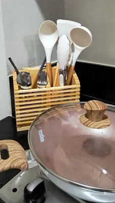a tray of utensils and a basket of spoons at El Marhabea Crib in Manila