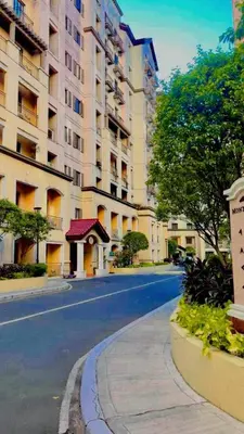an empty street in front of a large building at Casa Broganza in Manila