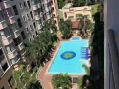 an overhead view of a large building with a swimming pool at Casa Broganza in Manila