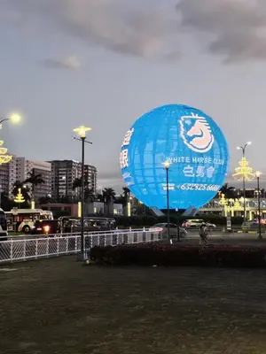 a large blue balloon sitting in a parking lot at Adventura Staycation in Manila