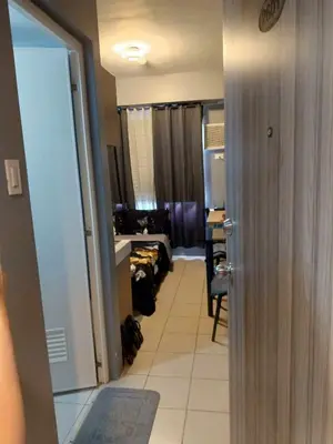 a room with a hallway with a room with a room at Berto's High Speed Wifi in Manila