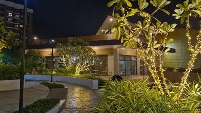 a building with christmas lights in front of it at NEW! The Hive Residences - 1BR with Balcony & FREE Parking at Casa Arbo in Taytay
