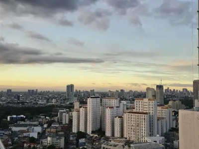 a view of a city from the top of a skyscraper at 1BR Condotel with Balcony at SM Light Residences #LT12 in Manila