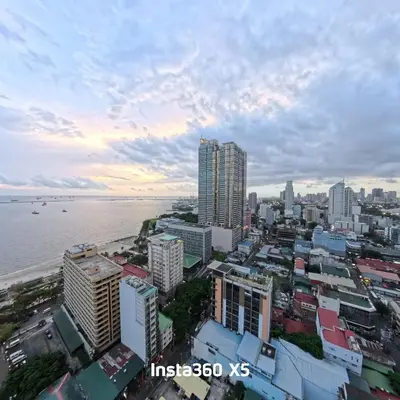 an aerial view of a city and the ocean at La nobleza terrazas condominium in Manila