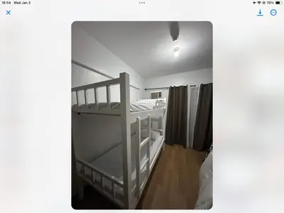 a small room with a bunk bed and a room with at Alea Residences Condominium Casa Hayakawa in Manila