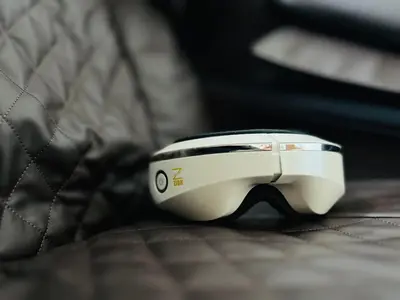 a white toaster sitting on top of a bed at CityZen Suite in Trece Martires
