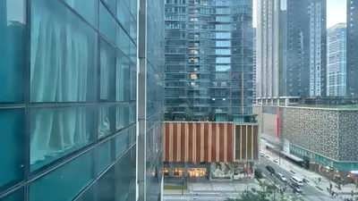 a view of a city with tall buildings at Full-Serviced Residential Apartment in One Uptown Residences, BGC in Manila