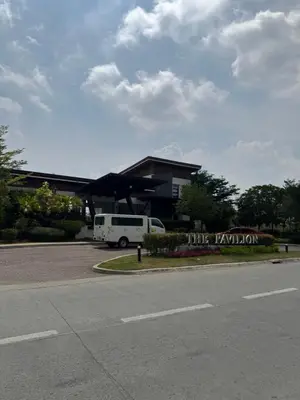 a white van parked in front of a building at Casa Mira in Dasmariñas