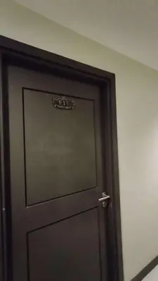 a door in a room with ajar door with a handle at Yuanhang 910 in Manila