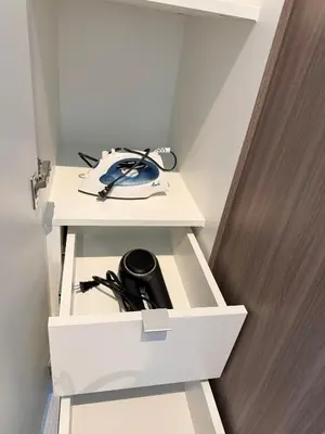 a white desk with a telephone on top of it at Elegant 1 bedroom apartment with great facilities and perfect location in Manila