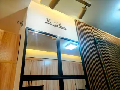 a door to a building with a sign on it at The Solace Place- Near Nuvali Sta Rosa Laguna in Bayabasan