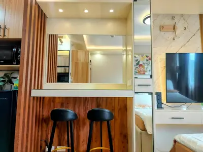 a room with two black stools in front of a mirror at The Solace Place- Near Nuvali Sta Rosa Laguna in Bayabasan