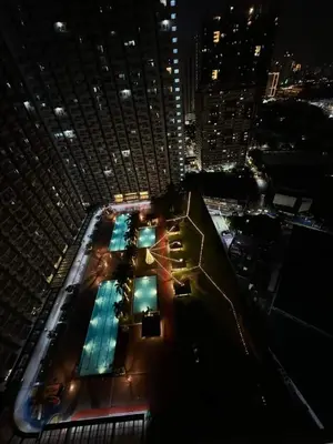 a view of a building at night with lights at Casa Cashmere in Light residences at Mandaluyong City in Manila