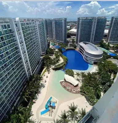 an aerial view of a resort with a swimming pool at Maldives Tower Azure in Manila
