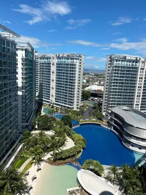 an aerial view of a resort with tall buildings at The Bahamas & Maldives Suites by Azure Urban Resort Residences in Manila