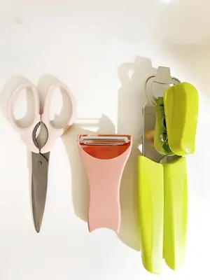 a group of different colored shoes and scissors at Manila Bay, Seaside living near MOA, Studio unit in Manila