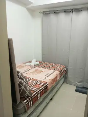 a small room with a bed in a room at CHIC ROOM pasay sea residence in Manila