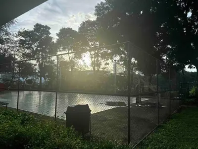 a fence in front of a body of water at Modern Japanese Resort-Type Condo in Manila
