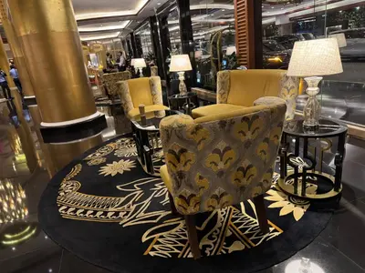 a room with chairs and tables in a store at Large Family Groups in Air residence Makati Gym Swim Park 300 mbps in Manila
