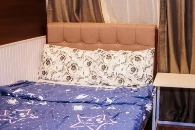 a bed with a pillow on top of it at 2 BR Air condo Makati Penthouse SwimGym 300Netflix 5249 in Manila