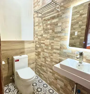 a bathroom with a toilet and a sink at Cozy Private Resort with Pool, Hijas Villa Binangonan in Binangonan