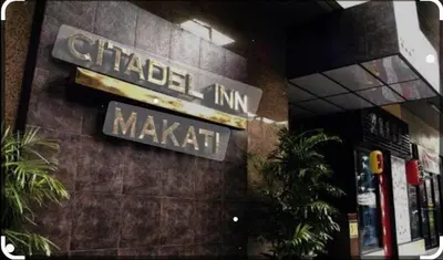 a street sign on the side of a building at Shore Residence a31 shortwalk Mall of Asia in Manila