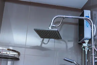 a shower head on a wall in a bathroom at Witty Weekend retreat Quirk Cozy in Manila