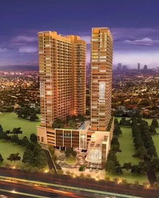 a view of two tall buildings in a city at The Radiance of Manila Bay in Manila