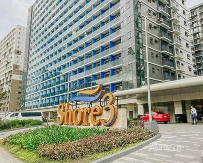 a sign in front of a large building at Aldo shore 3 tower 2 mall of Asia in Manila