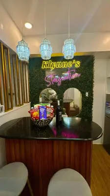 a restaurant with a counter with a bowl of candy at Azure Urban Resort Residences, 1BR Santorini 18th floor in Manila