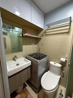 a bathroom with a toilet and a sink at Glamorous SMDC Shore 3, 5 Star Rate BnB-Wifi-Netflix in Manila
