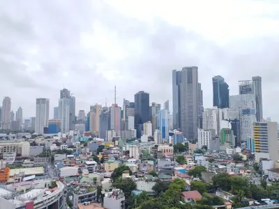 a view of a city with tall buildings at Delet CITADEL in Manila