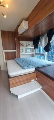 a bedroom with two bunk beds in a boat at Rikki Staycation in Manila