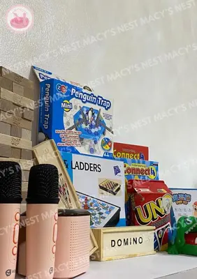 a pile of cereal and other food items on a table at Shore 2 Tower 1 - Macy's Nest - Near MOA in Manila