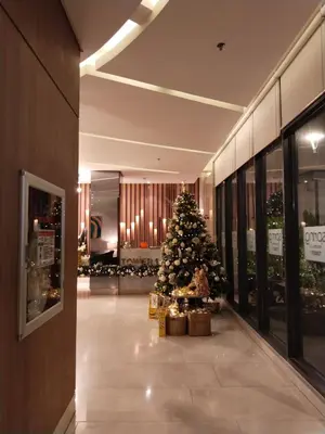 a christmas tree in the middle of a hallway at Dhayz Staycation in Manila