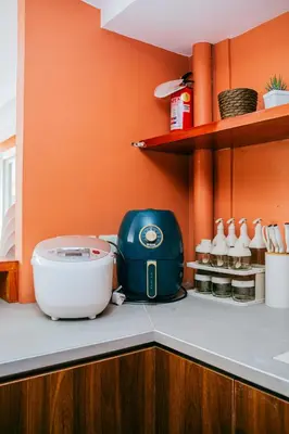 a kitchen counter with a toaster on top of it at Love, Lourdes Villa in Imus