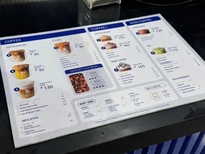 a menu for a fast food restaurant at Grand Riviera Suites 1202 front of US Embassy by Prime Stay in Manila
