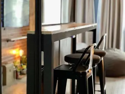 a table and two chairs in a room at LIXURY SUITES in S Residence Condo Pasay City in Manila