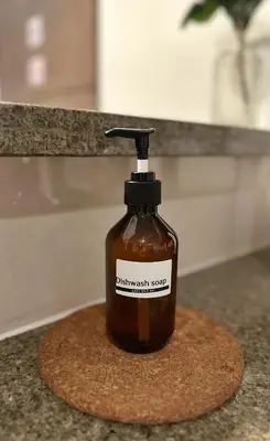 a soap dispenser sitting on top of a counter at Studio in Greenbelt with Wifi, Pool and Gym in Manila