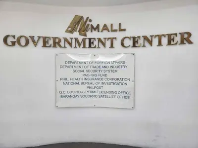 a sign for an animal government center on a wall at Araneta Cubao No Brown Outs 1BR Furnished Condo with Balcony free WiFi Netflix in Manila